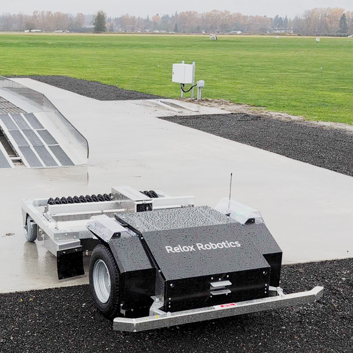 Relox Robotics Range Picker leaving Bridge to go collect balls at Snohomish Valley Golf Course